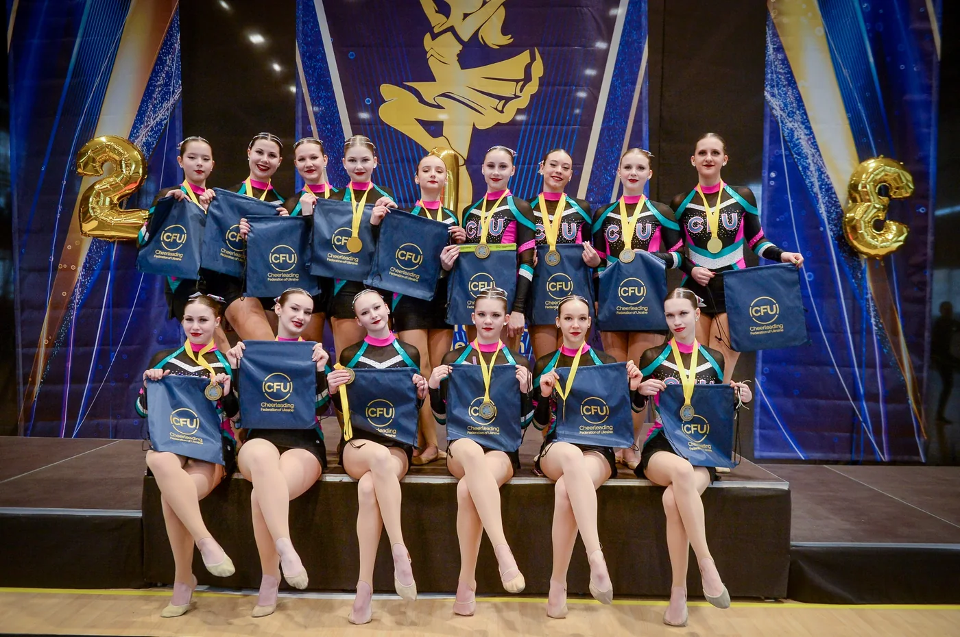 CheerLadies athletes with medals after competition